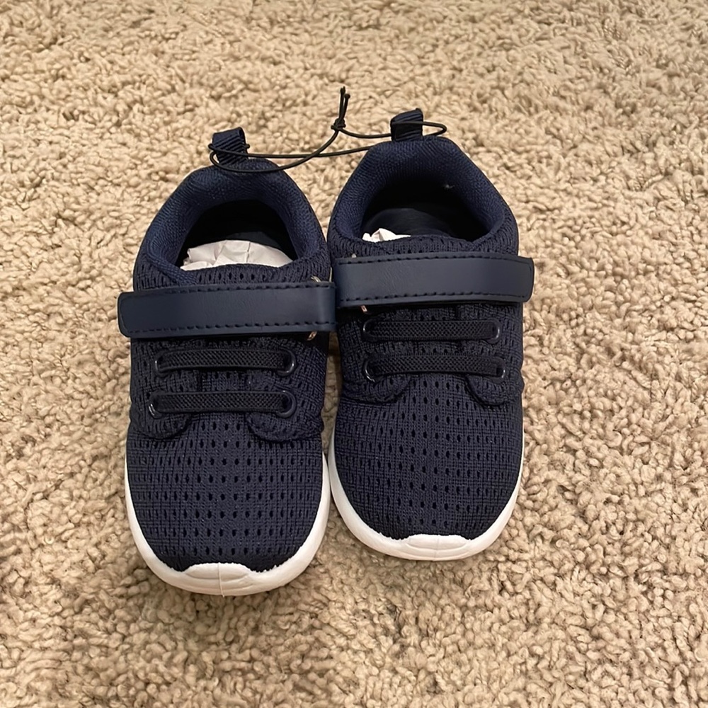 Never used Amazon brand tennis shoes. Navy, Velcro closure size 5 toddler boys